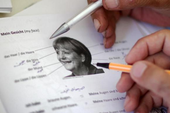 Портрет Ангелы Меркель - пособие для мигрантов