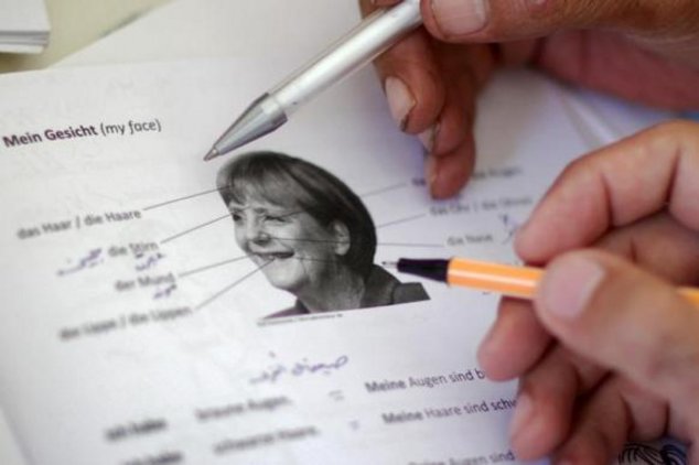 Портрет Ангелы Меркель - пособие для мигрантов